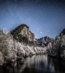 River and mountain at night
